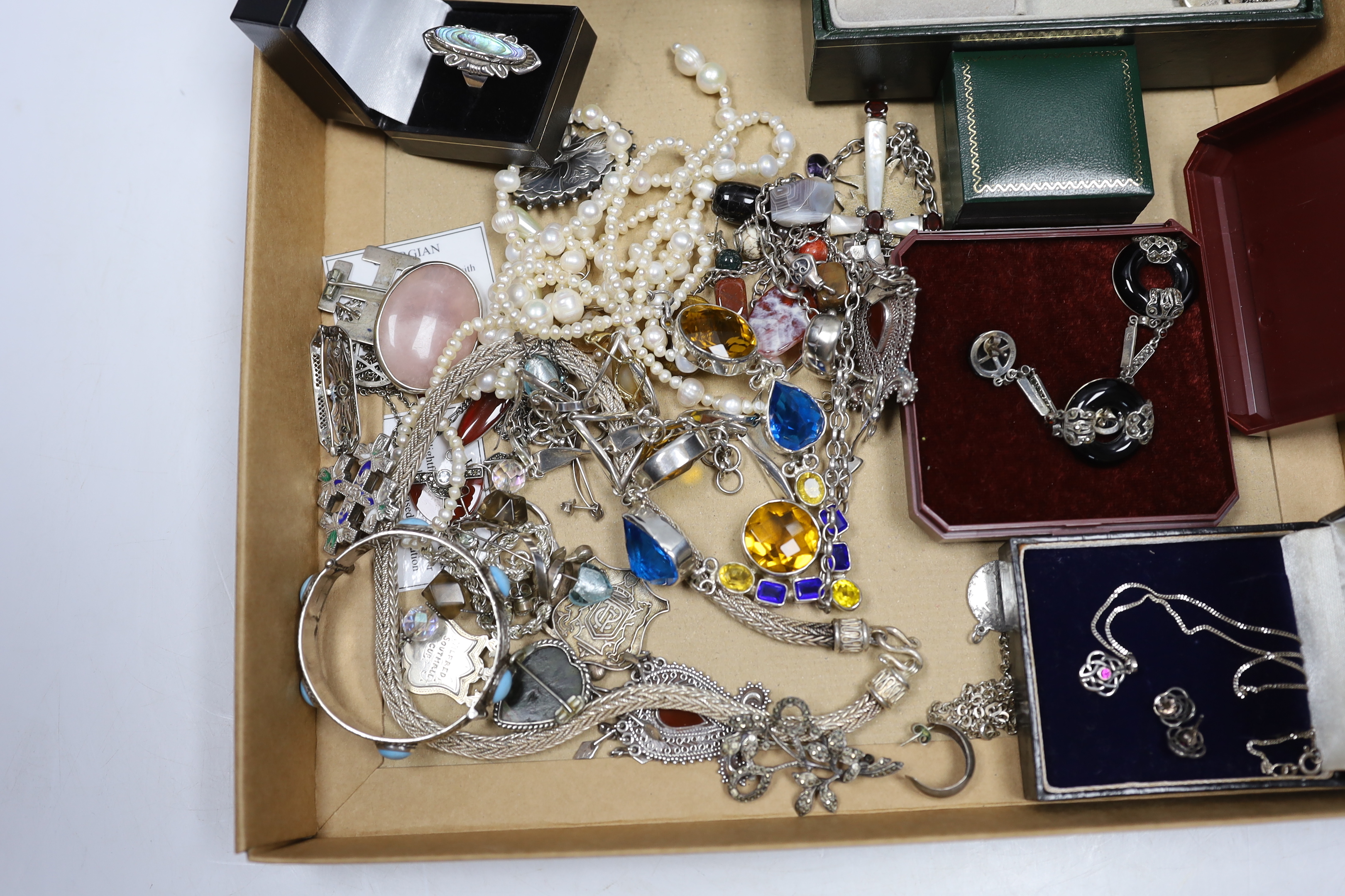 A quantity of assorted silver, 925, white metal and other jewellery including torque necklace, cross pendant necklace, marcasite and onyx set drop earrings, enamelled cross brooch, bangle, medals, dress rings, freshwater